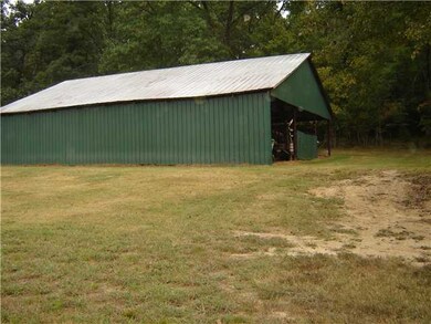 METAL ROOF AND SIDES ON BARN APPROX. 35X55. COULD 
