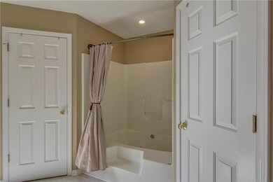 Enjoy soaking in the large step in garden tub and 