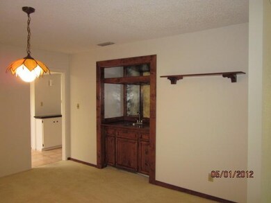 Formal dining room with wet bar.