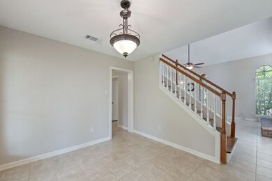 The formal dining room is open to the living area-