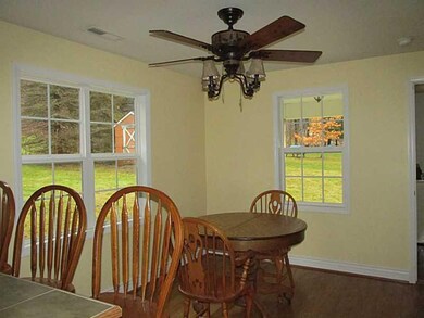 Dining Room. New windows, floors, and lighting!