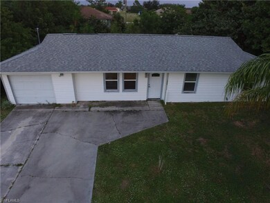 Nice home with extra wide driveway.