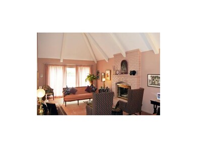 Dramatic Family Room with Wet Bar and Vaulted Ceil