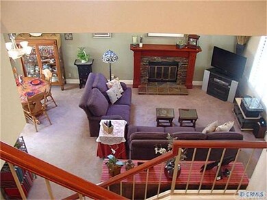 View of living Room and dining room from upstairs 