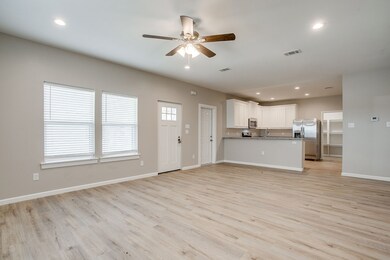 Unfurnished living room featuring recessed lighting, light wood finished floors, and ceiling fan