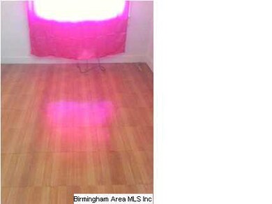 Bedroom w hardwood floors