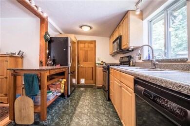 Galley style kitchen with private...