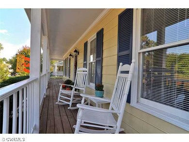 Exterior Front - Relax on the Full Country Porch w