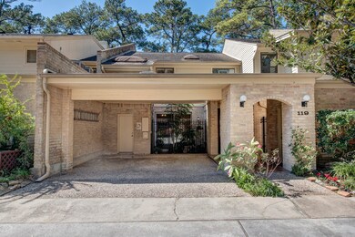 Beautifully landscaped townhome with lots of windo