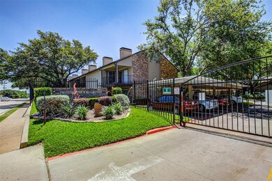 Gated entry and perimeter fencing around complex