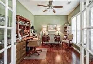 Office featuring french doors, wood finished floors, and a ceiling fan