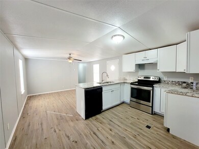 401 S Woodson St unit 7, Willis, TX 77378 - photo 3