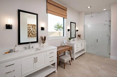 Primary bath with dual freestanding vanities