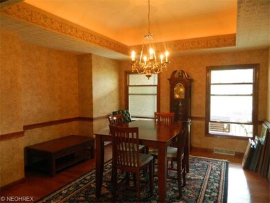 Formal dining room with beautiful hardwood floors 