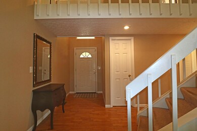 Foyer area with open staircase
