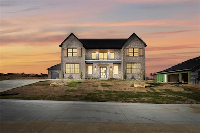 View of front facade at sunset