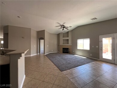 Unfurnished living room with a ceiling fan, light