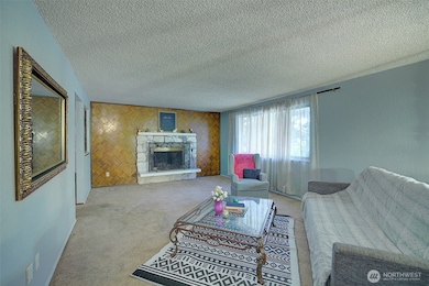 Another angle of the livingroom with its own fireplace