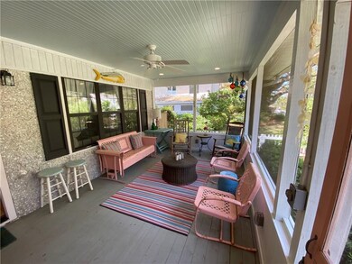 Relax on the screened front porch and savor the am