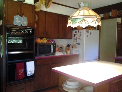 Double oven, lots of cabinets, center island