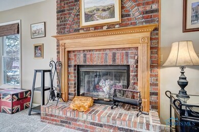 Family room with wood burning fireplace