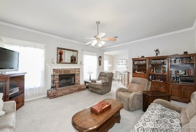 Living area is open to kitchen and breakfast nook.