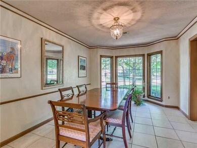 Dining Room. Tiled dining area with big beautiful 