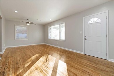 Open space wealth of natural light, ceiling fan, a