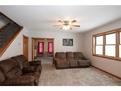 Living room. Hardwood floors under carpet on the m