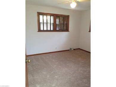 Bedroom with new carpet.