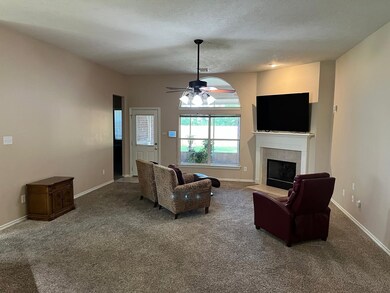 Spacious and Open Living Area with Gas Log Firepla