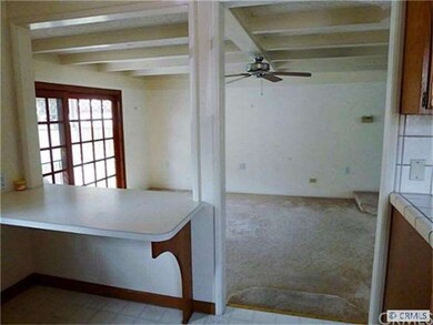 Bar counter overlooks the large room.