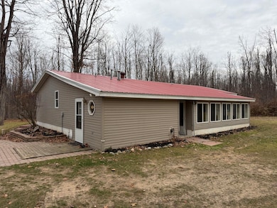 765 Mcgregor Rd, Vanderbilt, MI 49795 - photo 5