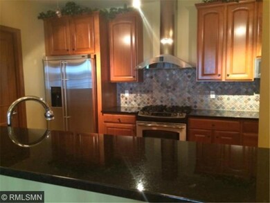 Gourmet kitchen w stainless steel appliances, gran