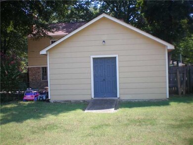 HUGE workshop and 2 car garage plus extra parking