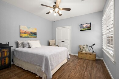 Secondary bedroom downstairs makes a perfect guest suite with full bathroom.