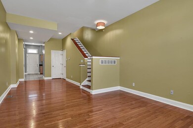 Woods floors, open plan, and 10 foot ceilings give