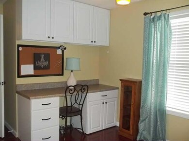 2nd Bedroom with desk and storage area