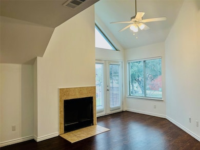 Unfurnished living room with visible vents, ceilin