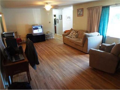 Living Room. Looking back with the fireplace at yo