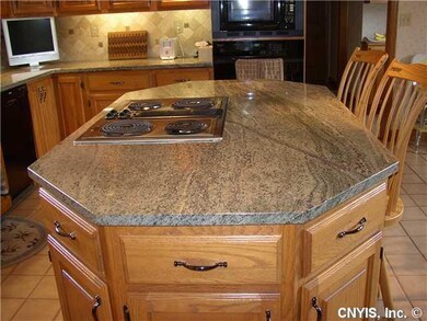Kitchen CENTER ISLAND WITH UPDATED GRANITE COUNTER
