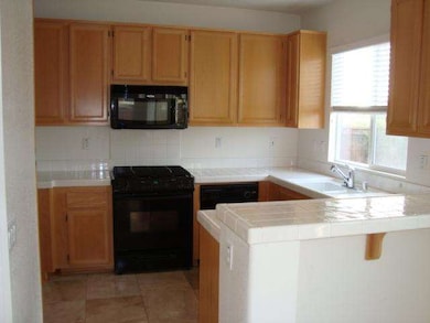 KITCHEN FROM DINING ROOM