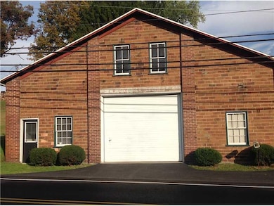 Parking Lot/Garage. Owner used to run business out