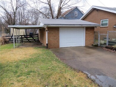 1 Car Garage + Carport.