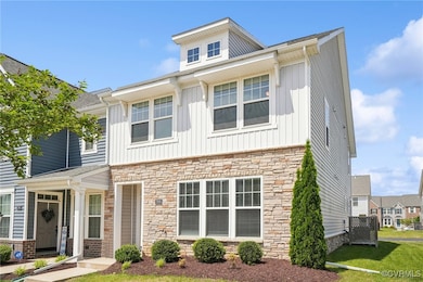 View of front of property with stone siding and bo