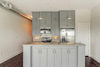 Unit features bespoke pendant lighting and designe