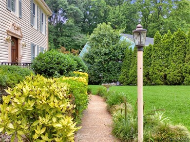 View of community featuring a yard
