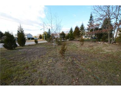 Land. Front corner of yard