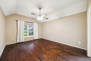 Primary Bedroom with high ceilings and bay window