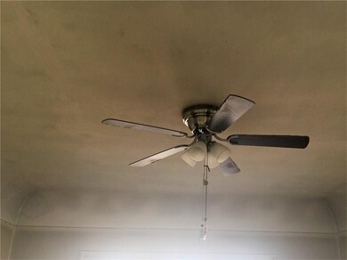 Living room with concave ceilings.